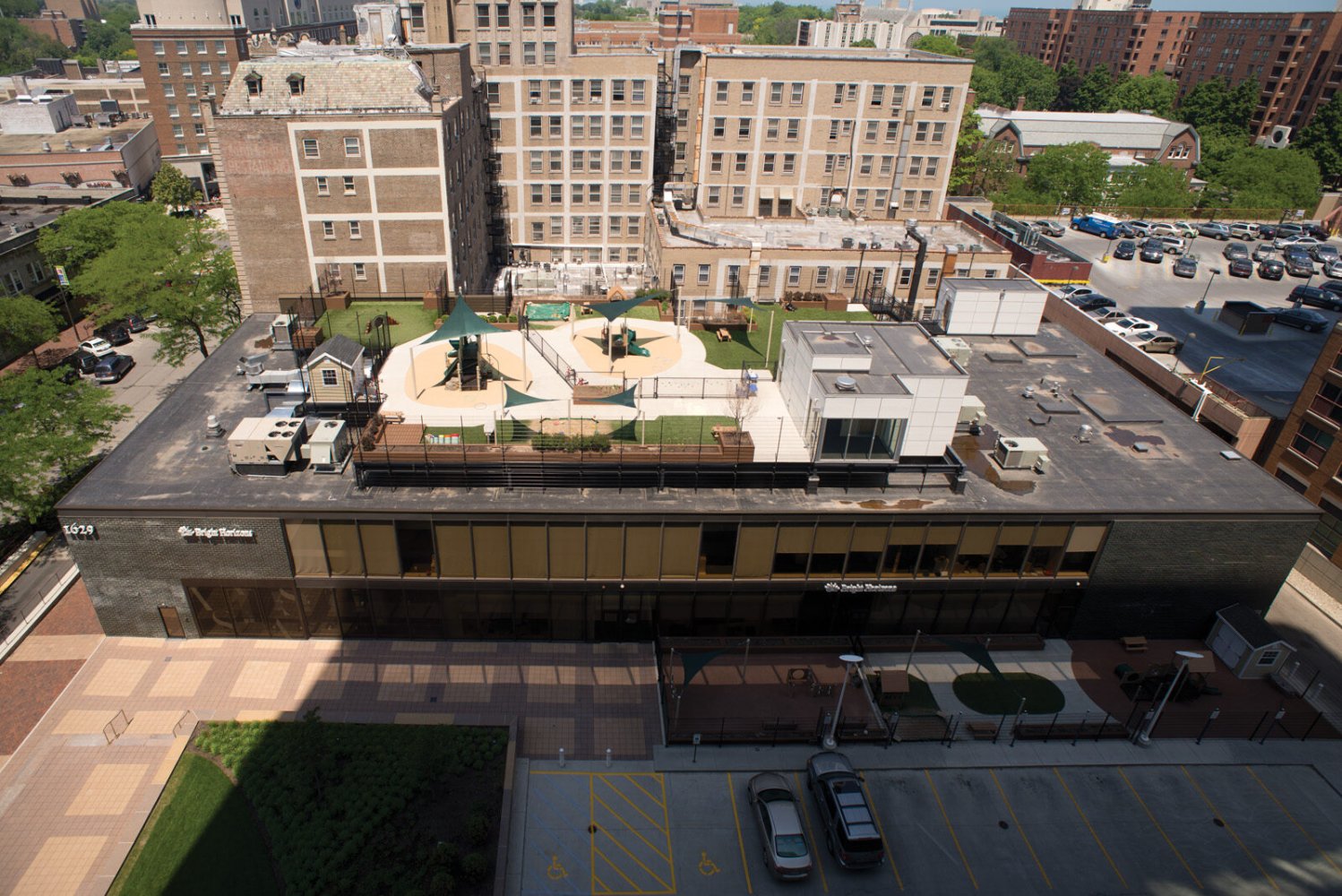 Aerial view of the Bright Horizons building at 1629 Orrington with its landscaped rooftop playground
